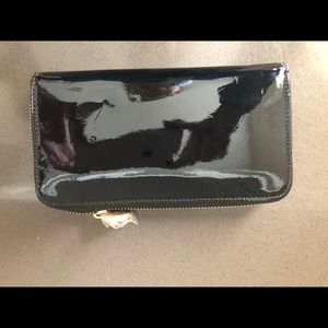 NIQUEA.D black pattern leather evening clutch.